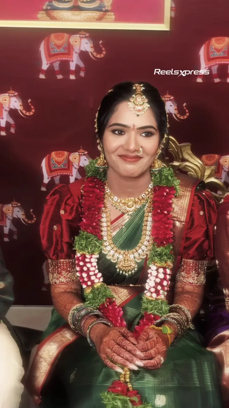 Bride showing mehndi during a ReelsXpress Pellikuthuru reel