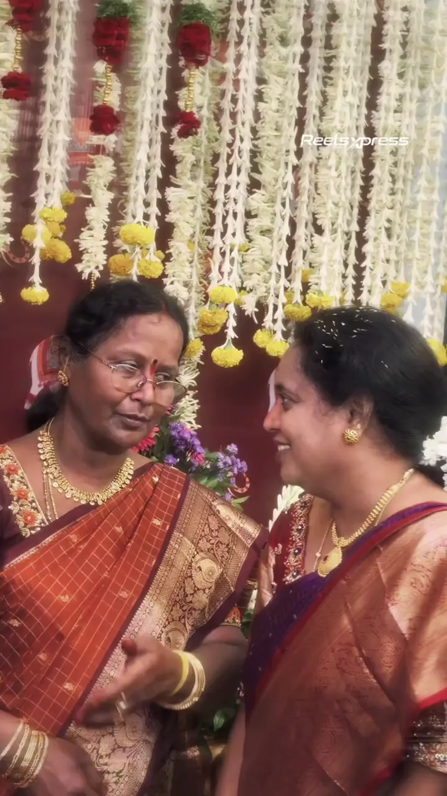Family members speaking together during a wedding function